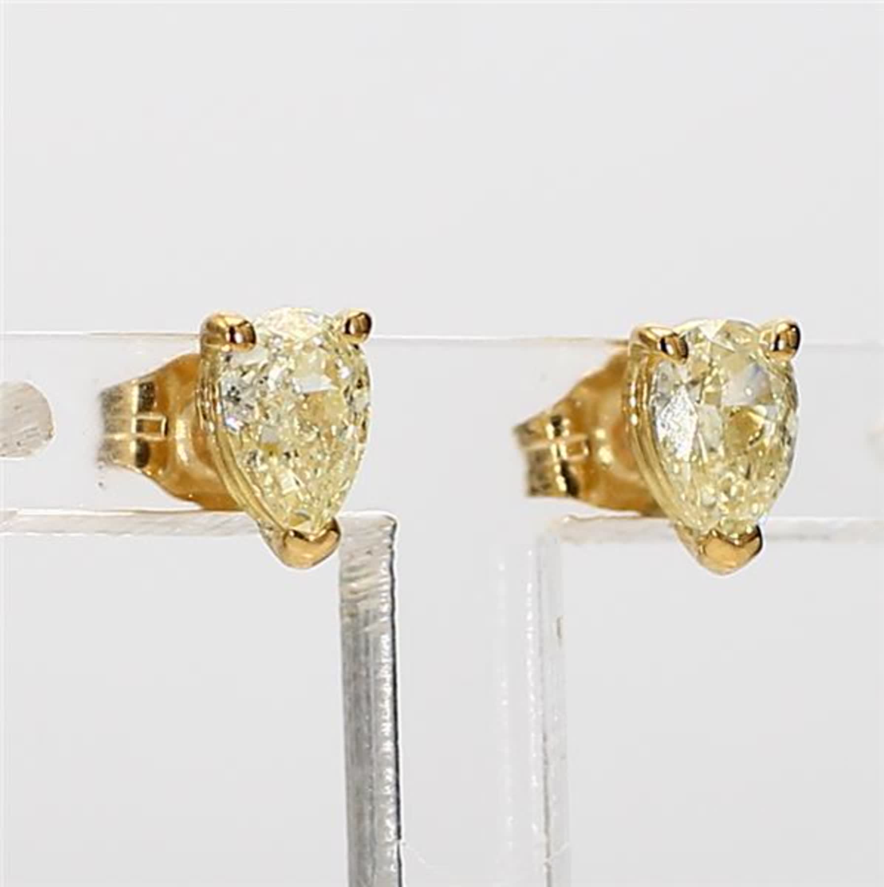 Natural Yellow Pear Diamond .84 Carat TW Yellow Gold Stud Earrings