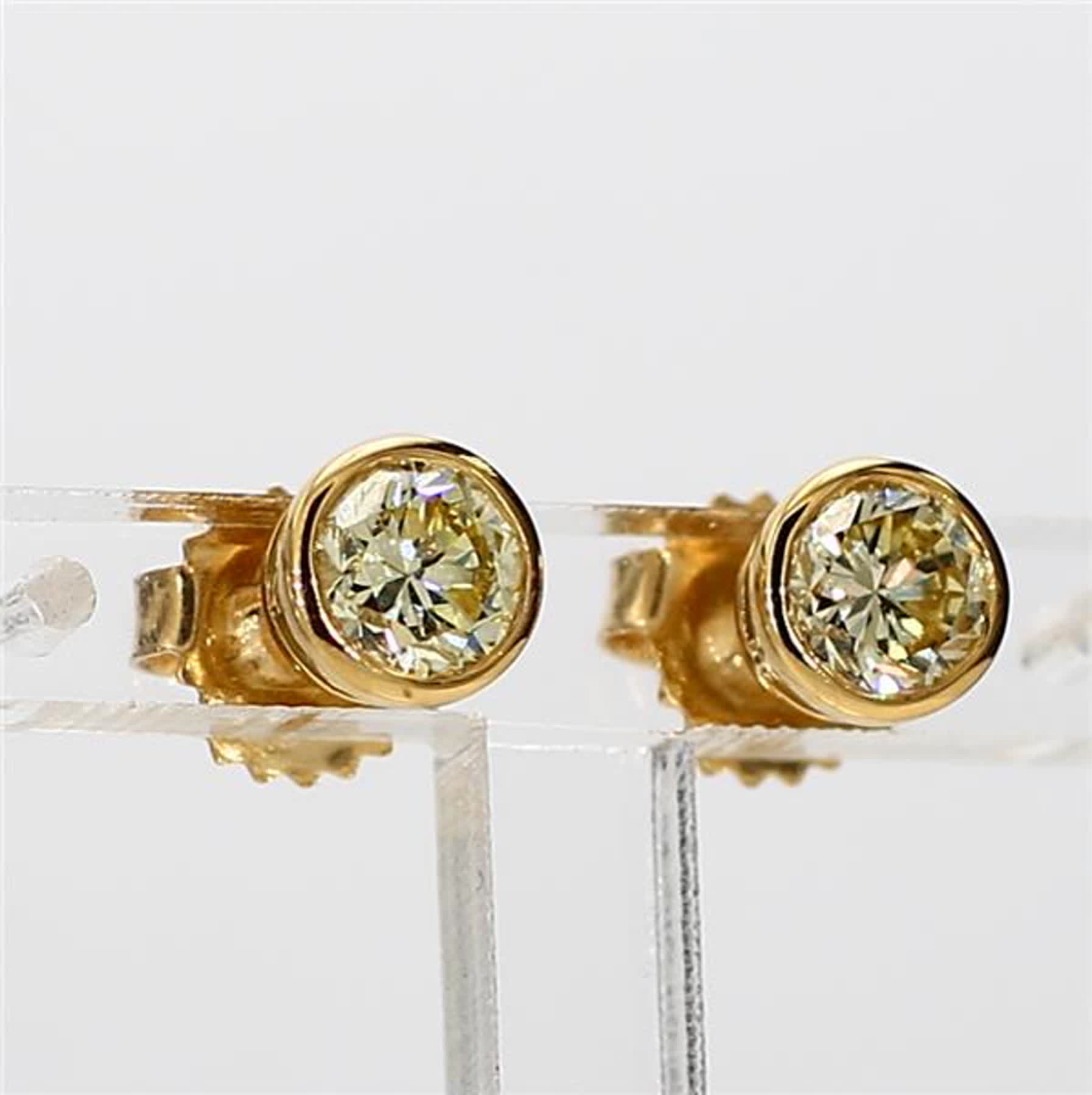 Natural Yellow Round Diamond 1.06 Carat TW Yellow Gold Stud Earrings