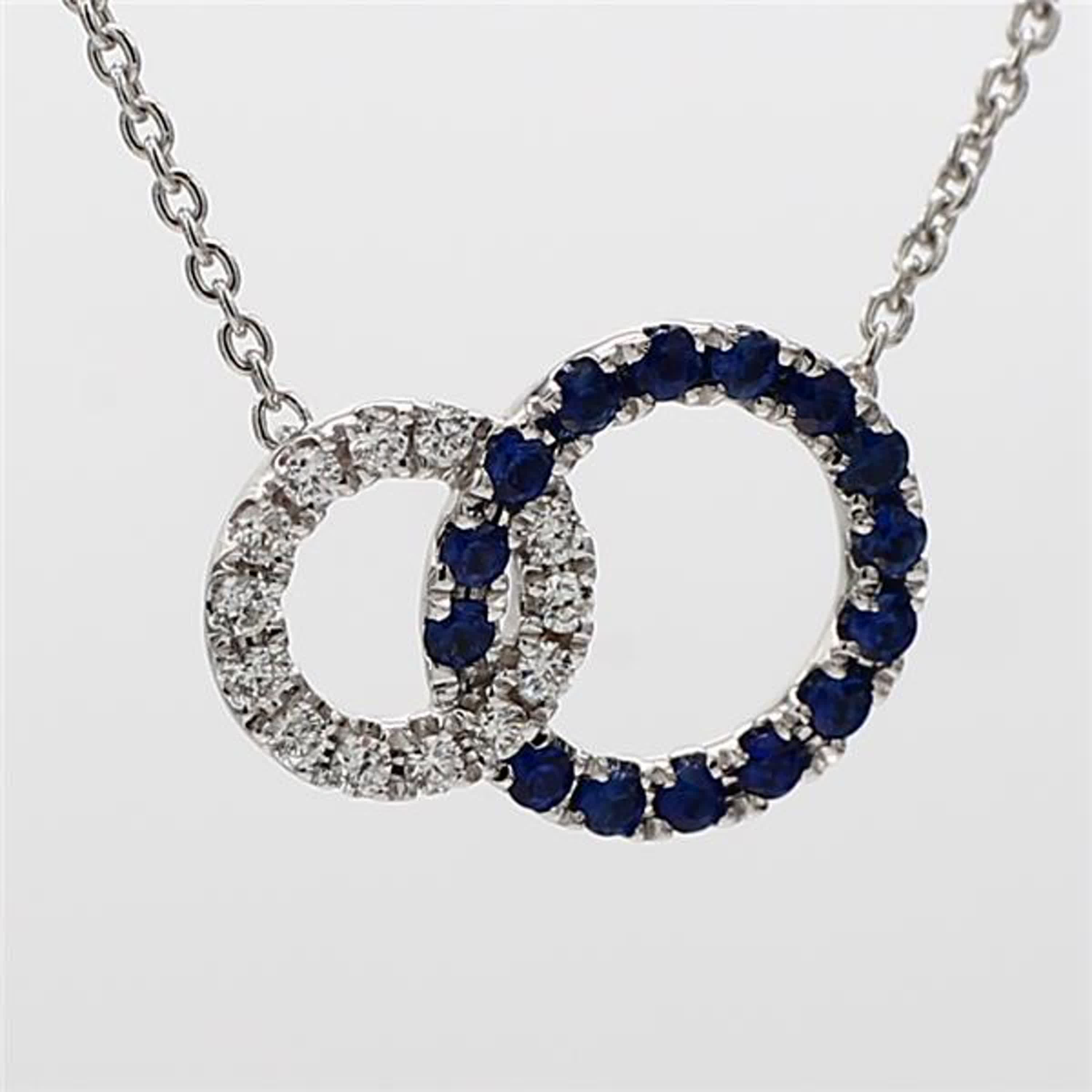 Natural Blue Round Sapphire and White Diamond .36 Carat TW White Gold Pendant