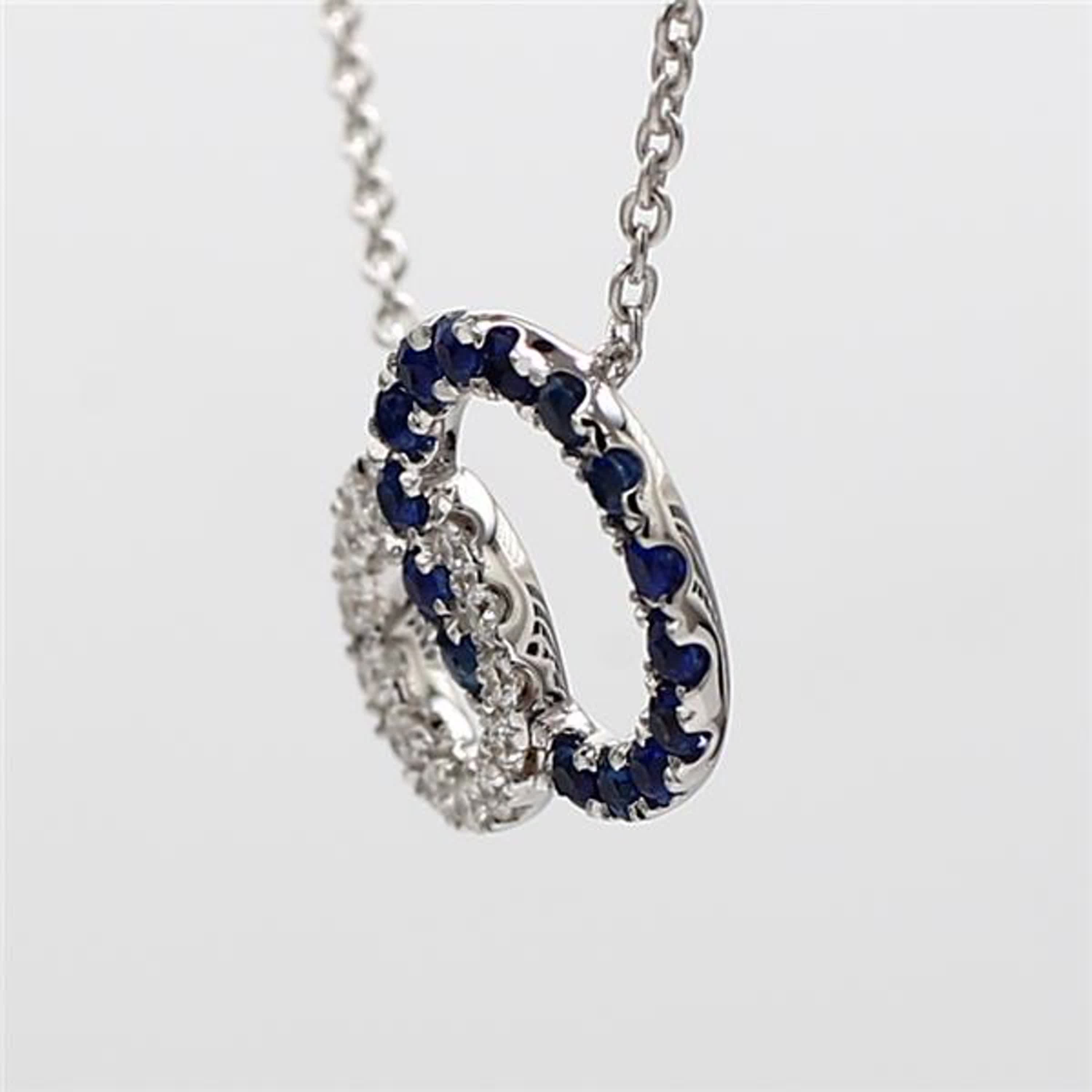 Natural Blue Round Sapphire and White Diamond .36 Carat TW White Gold Pendant