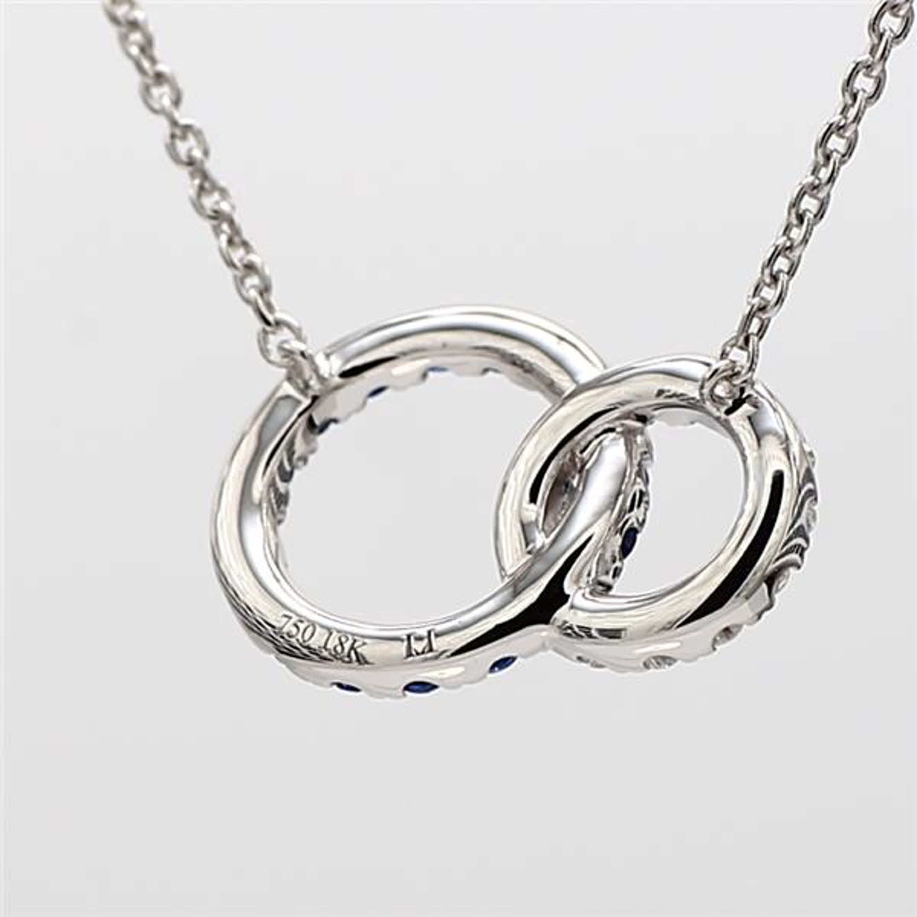 Natural Blue Round Sapphire and White Diamond .36 Carat TW White Gold Pendant