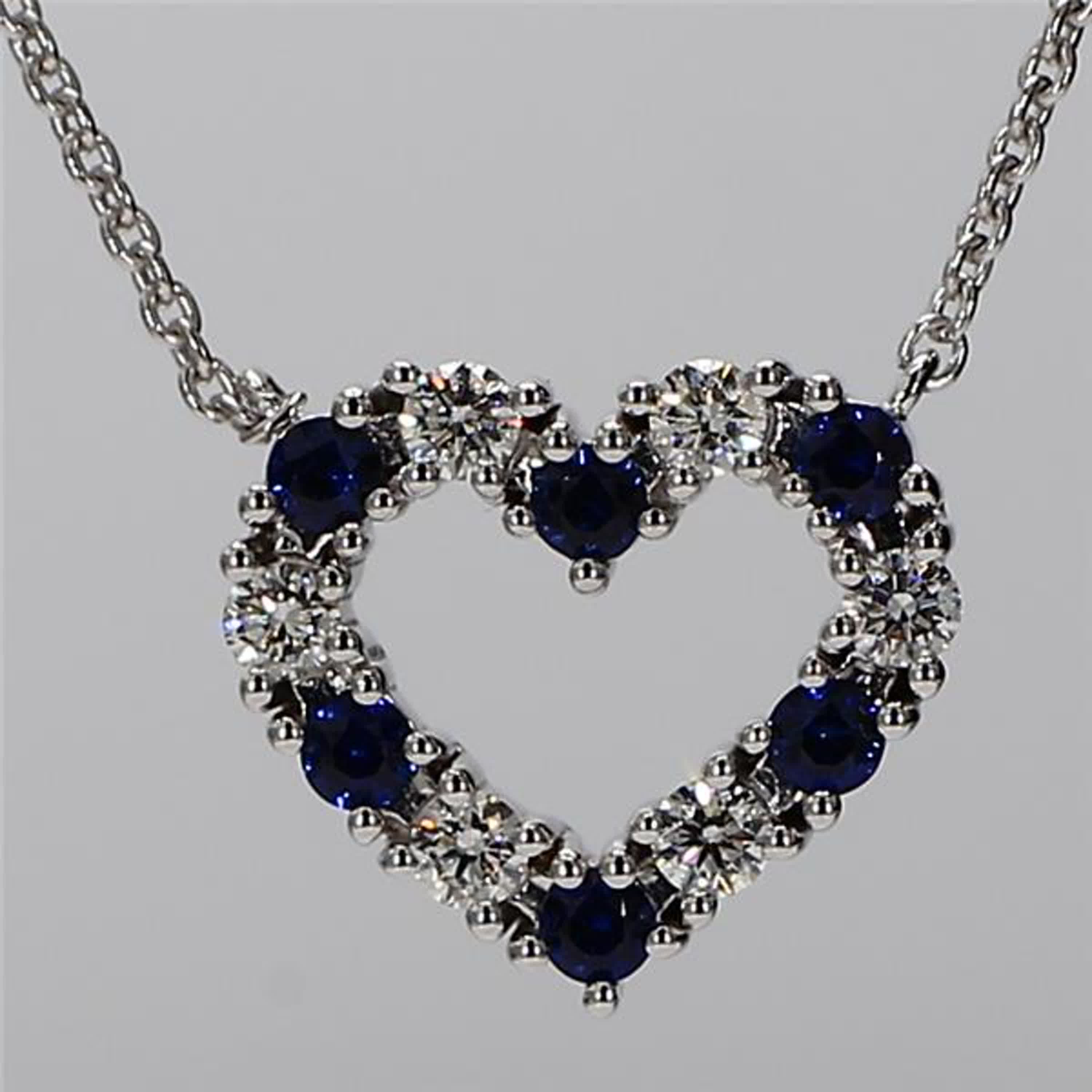Natural Blue Round Sapphire and White Diamond .53 Carat TW White Gold Pendant