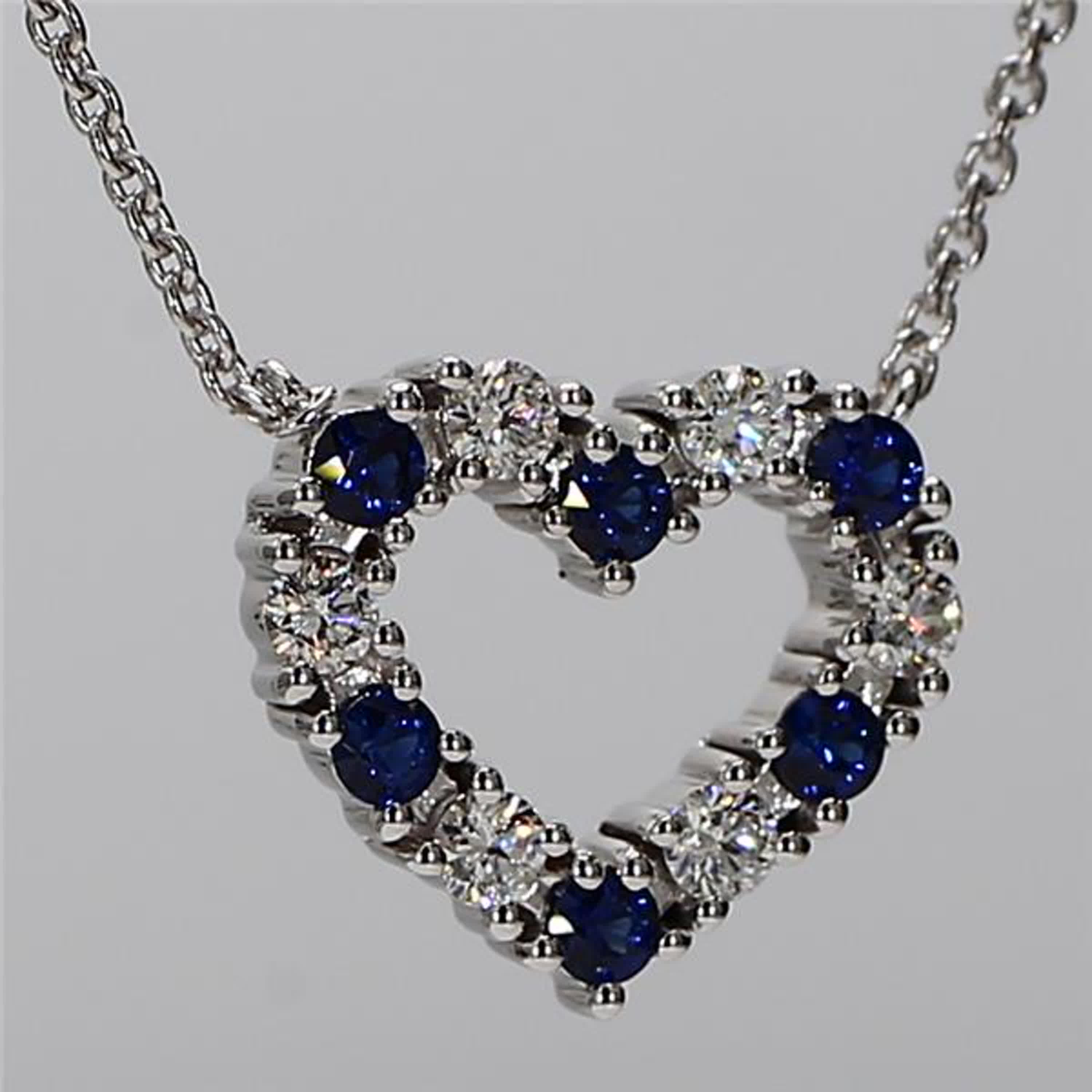 Natural Blue Round Sapphire and White Diamond .53 Carat TW White Gold Pendant