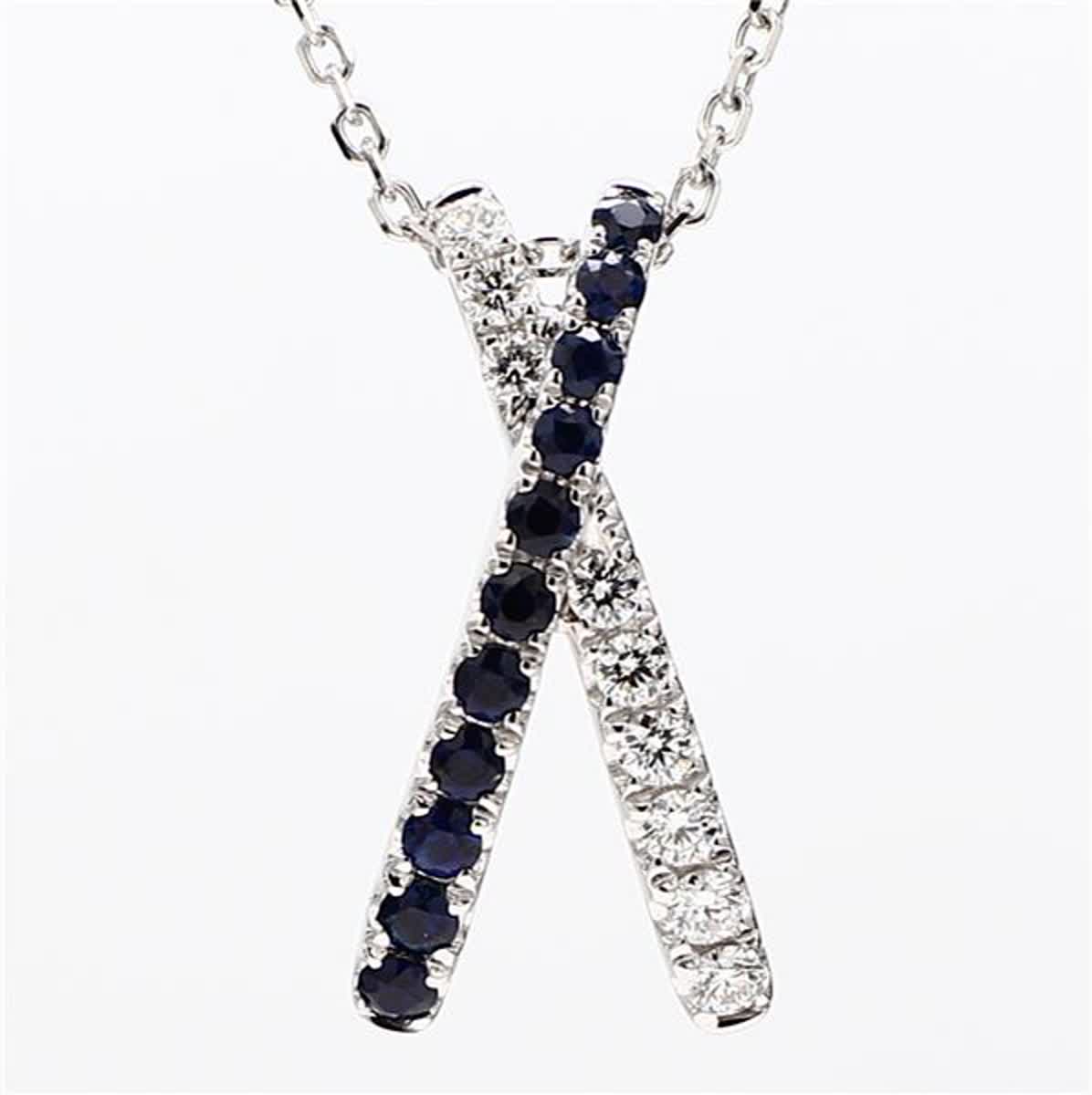 Natural Blue Round Sapphire and White Diamond .69 Carat TW White Gold Pendant