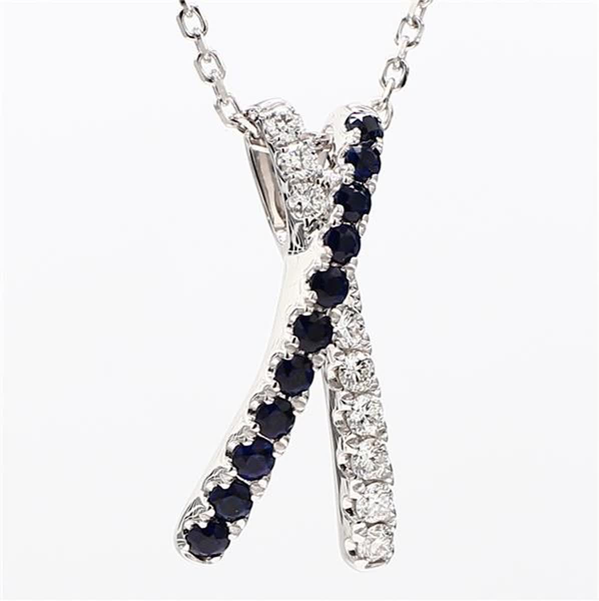 Natural Blue Round Sapphire and White Diamond .69 Carat TW White Gold Pendant