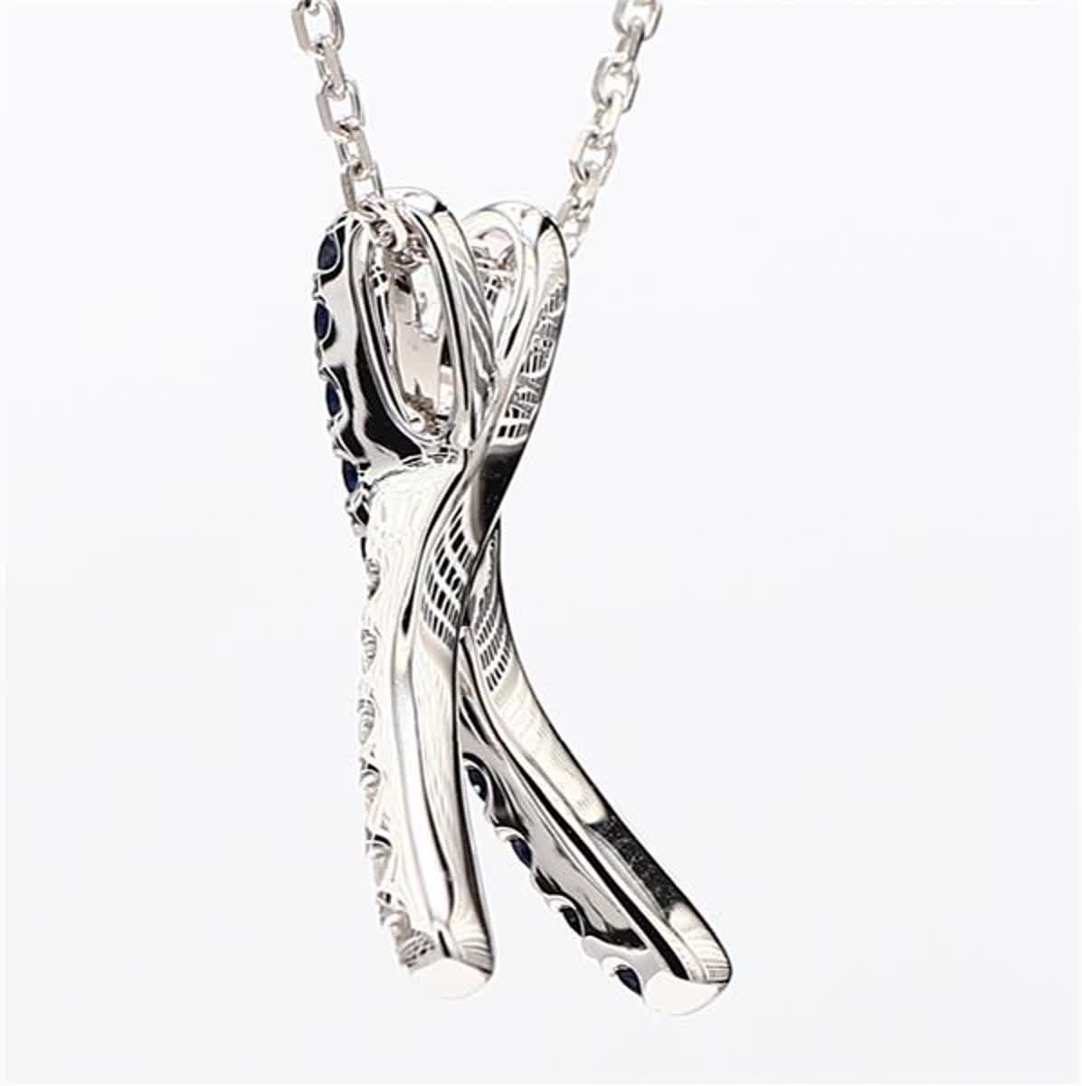 Natural Blue Round Sapphire and White Diamond .69 Carat TW White Gold Pendant