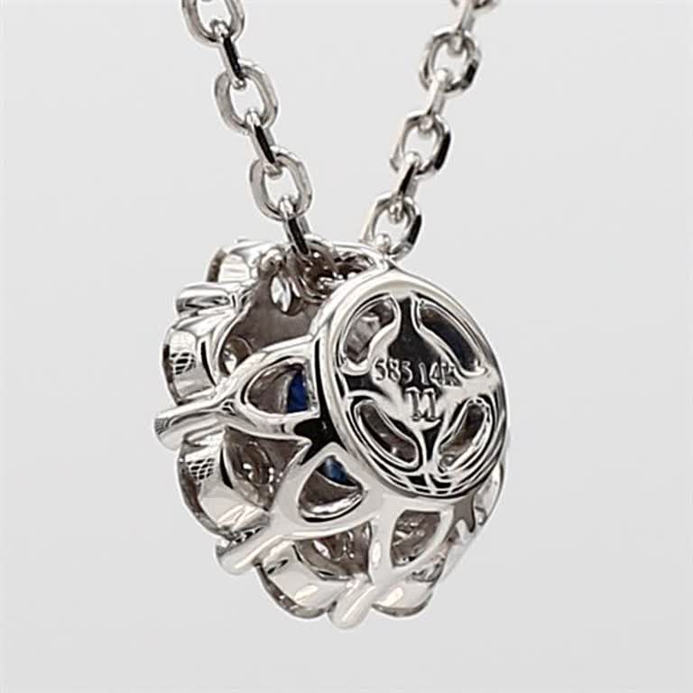 Natural Blue Round Sapphire and White Diamond .88 Carat TW White Gold Pendant