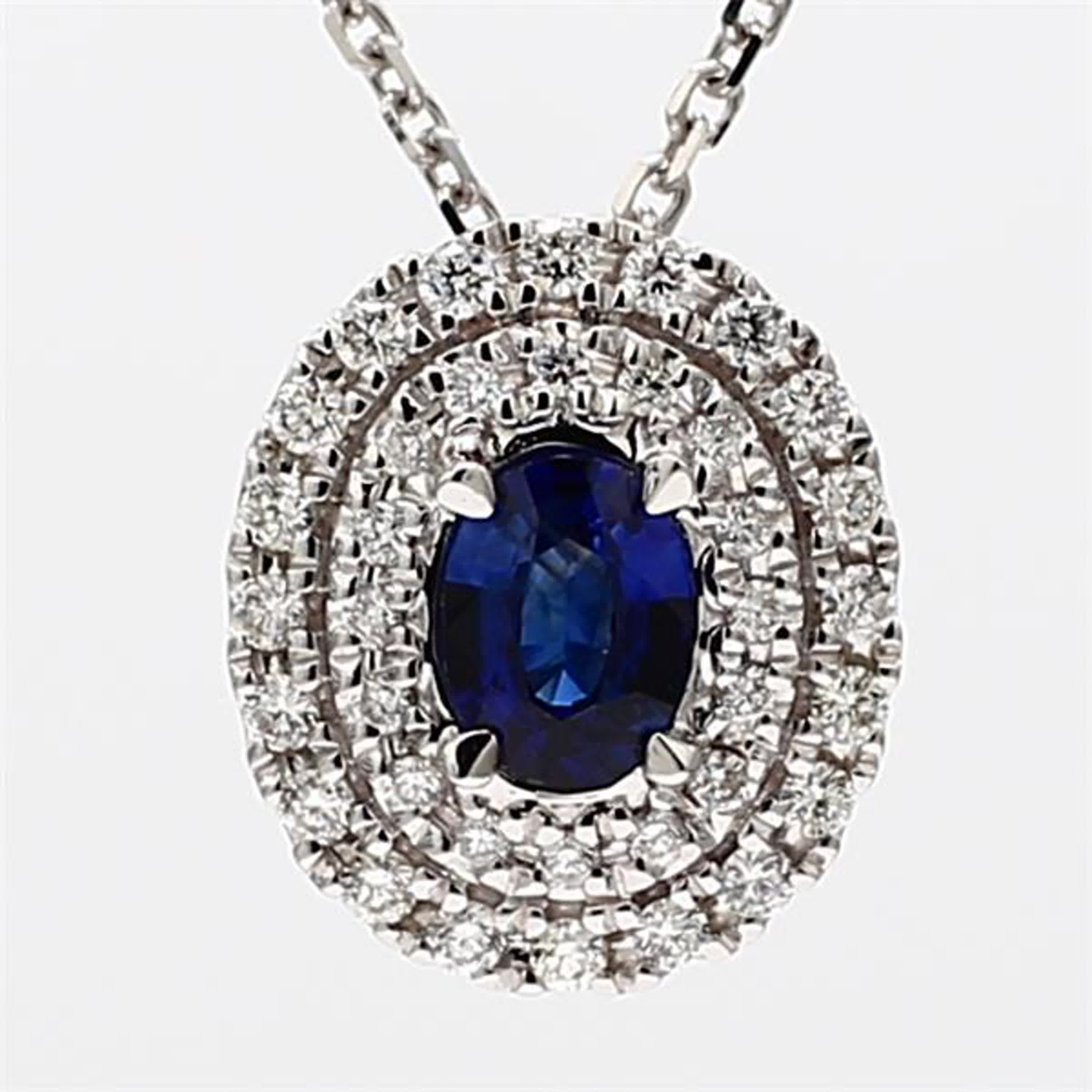 Natural Blue Oval Sapphire and White Diamond .67 Carat TW White Gold Pendant
