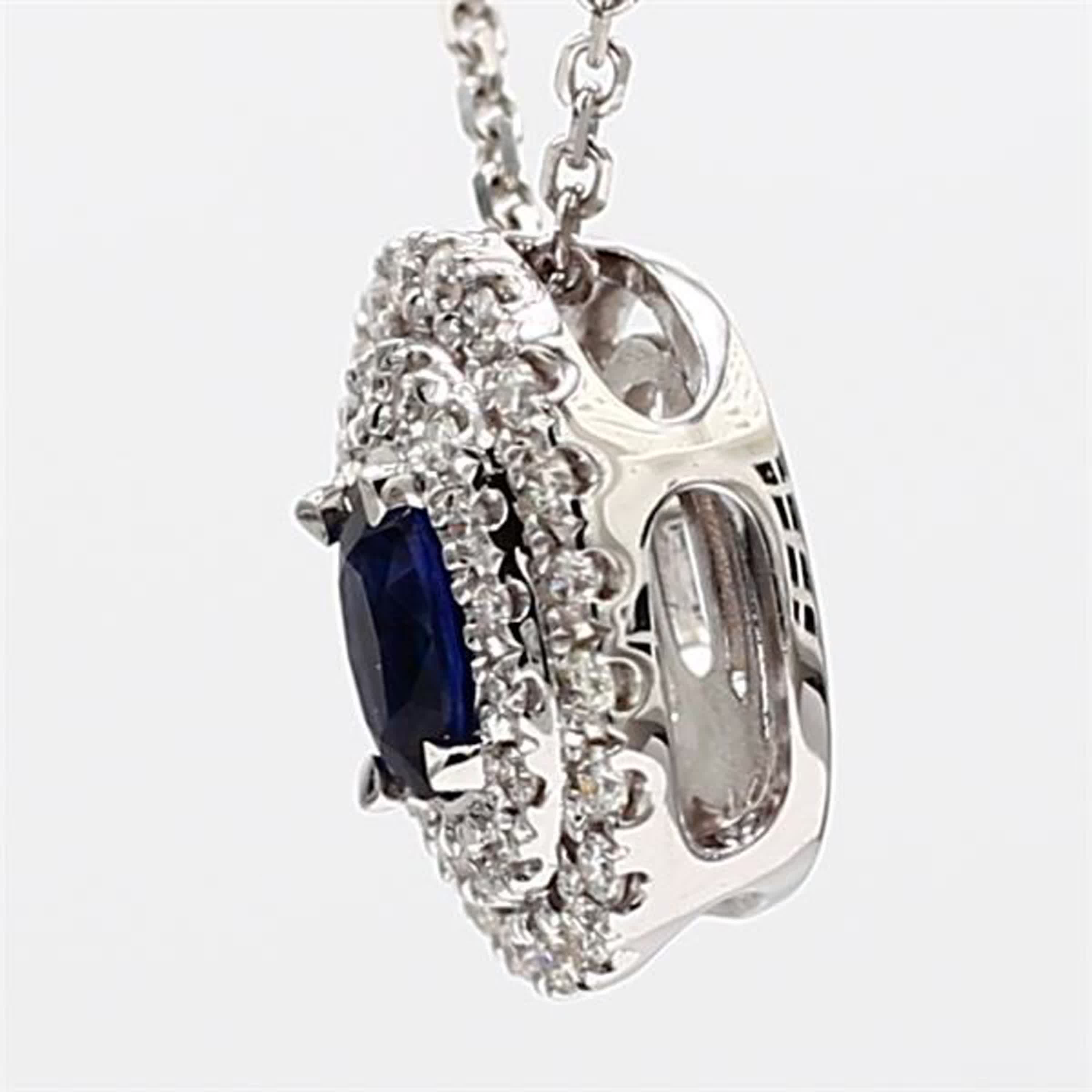Natural Blue Oval Sapphire and White Diamond .67 Carat TW White Gold Pendant