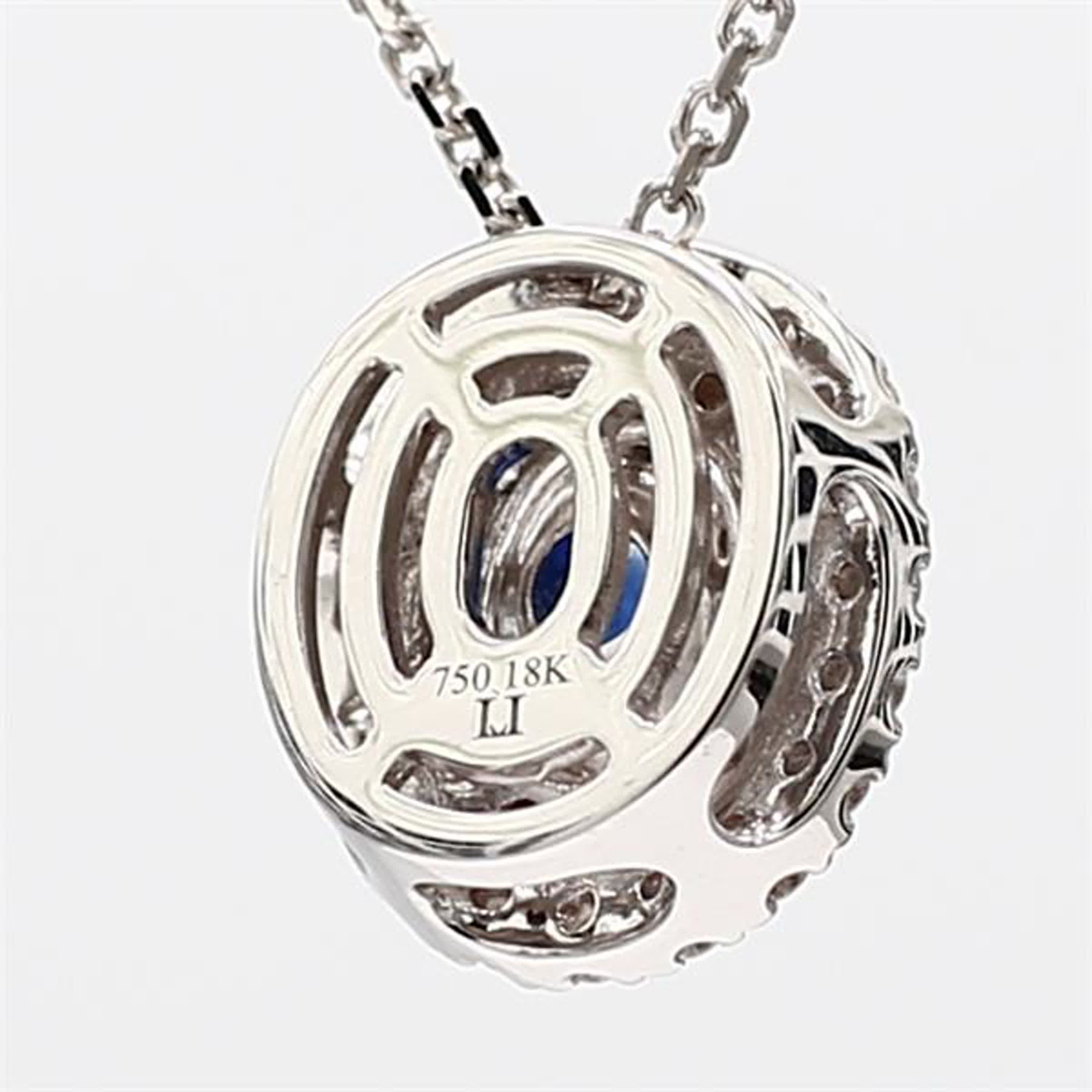 Natural Blue Oval Sapphire and White Diamond .67 Carat TW White Gold Pendant