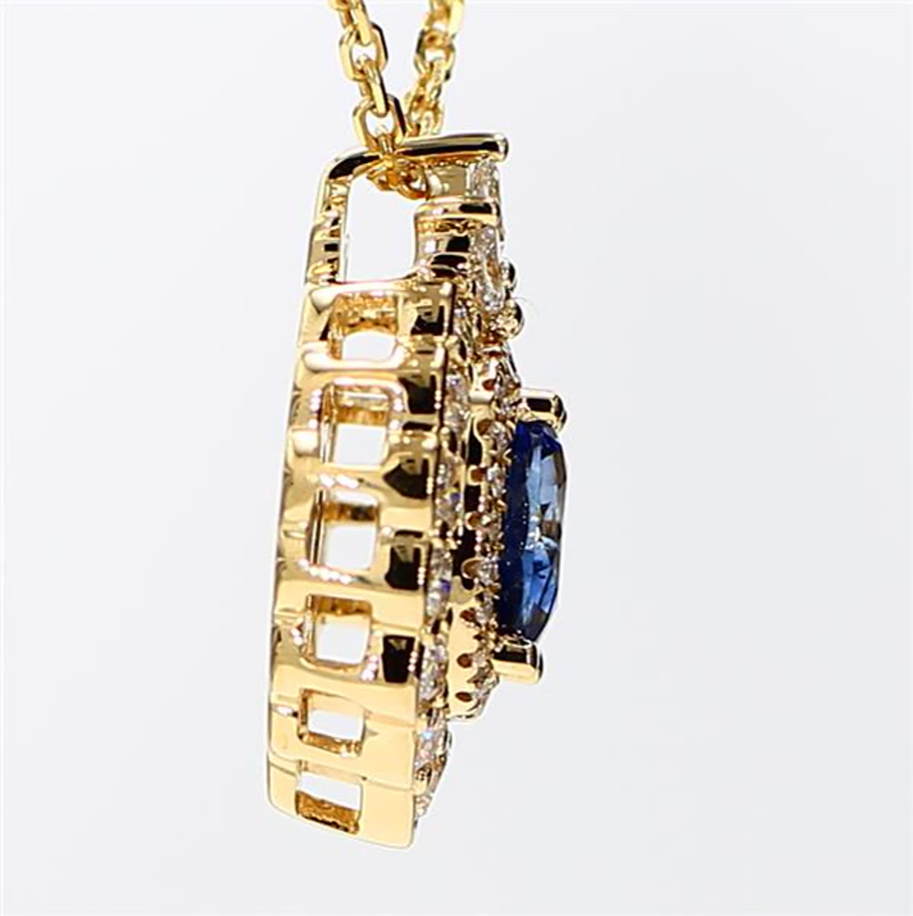 Natural Blue Oval Sapphire and White Diamond 2.09 Carat TW Yellow Gold Pendant