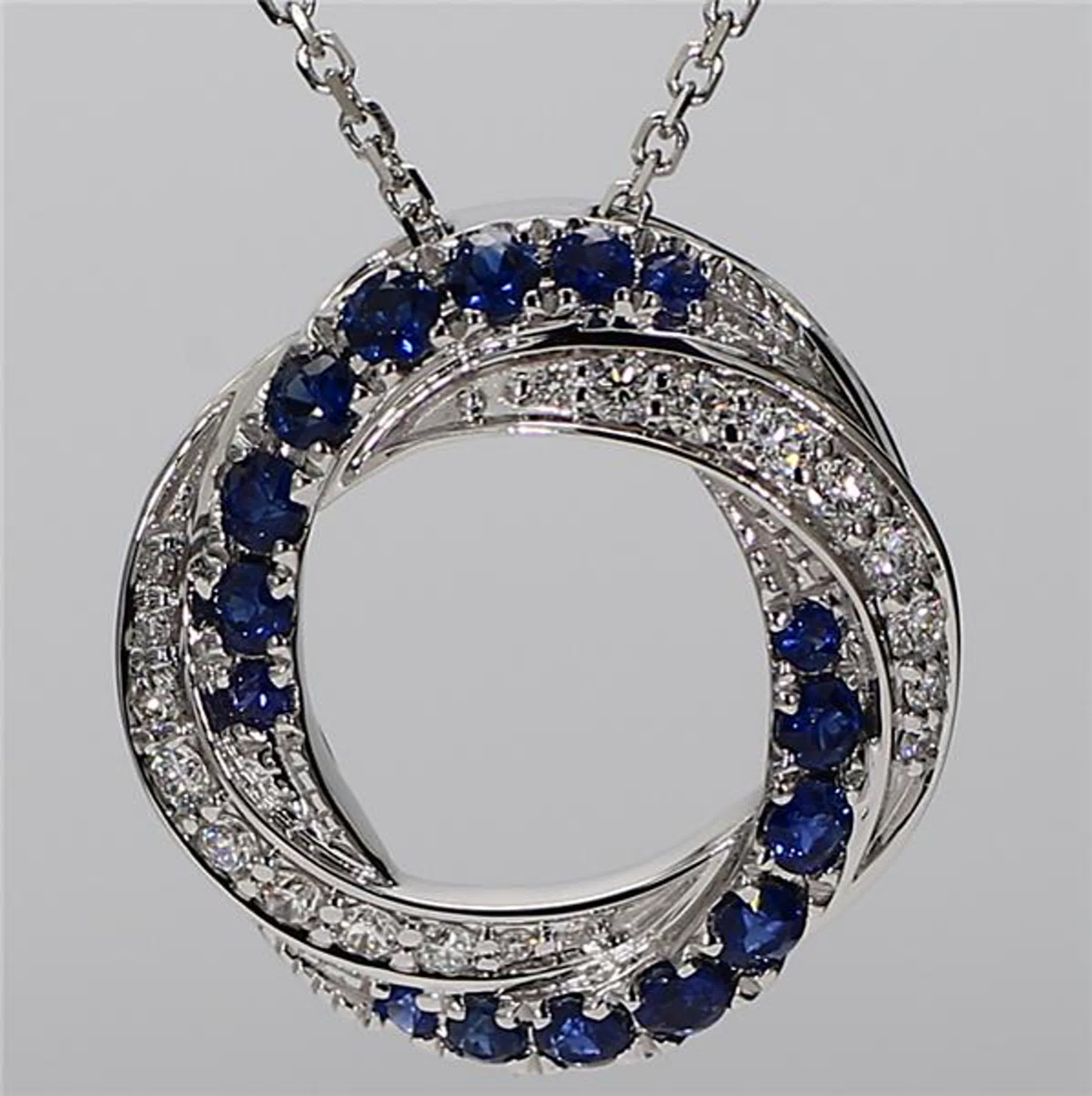 Natural Blue Round Sapphire and White Diamond .78 Carat TW White Gold Pendant