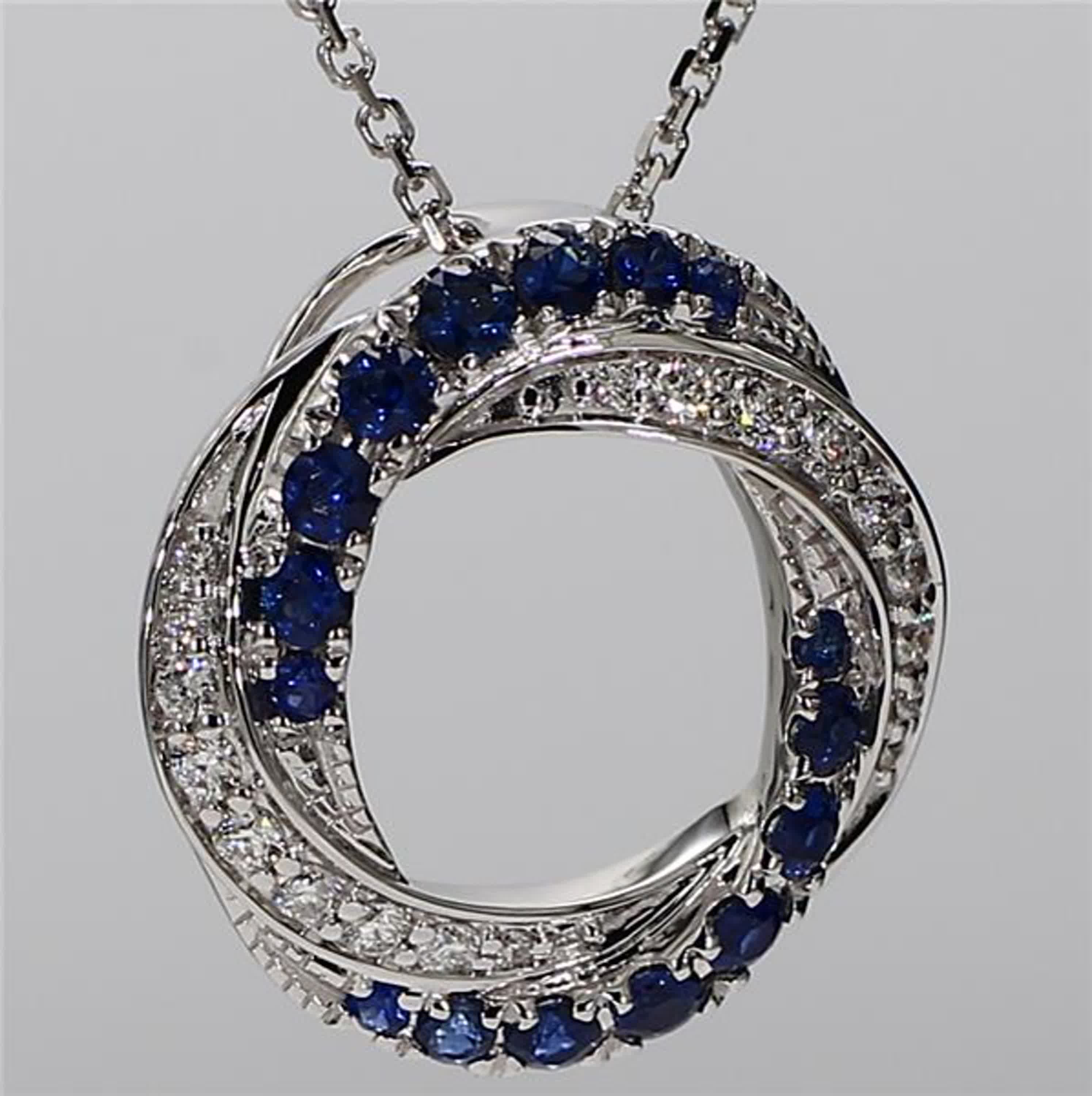 Natural Blue Round Sapphire and White Diamond .78 Carat TW White Gold Pendant
