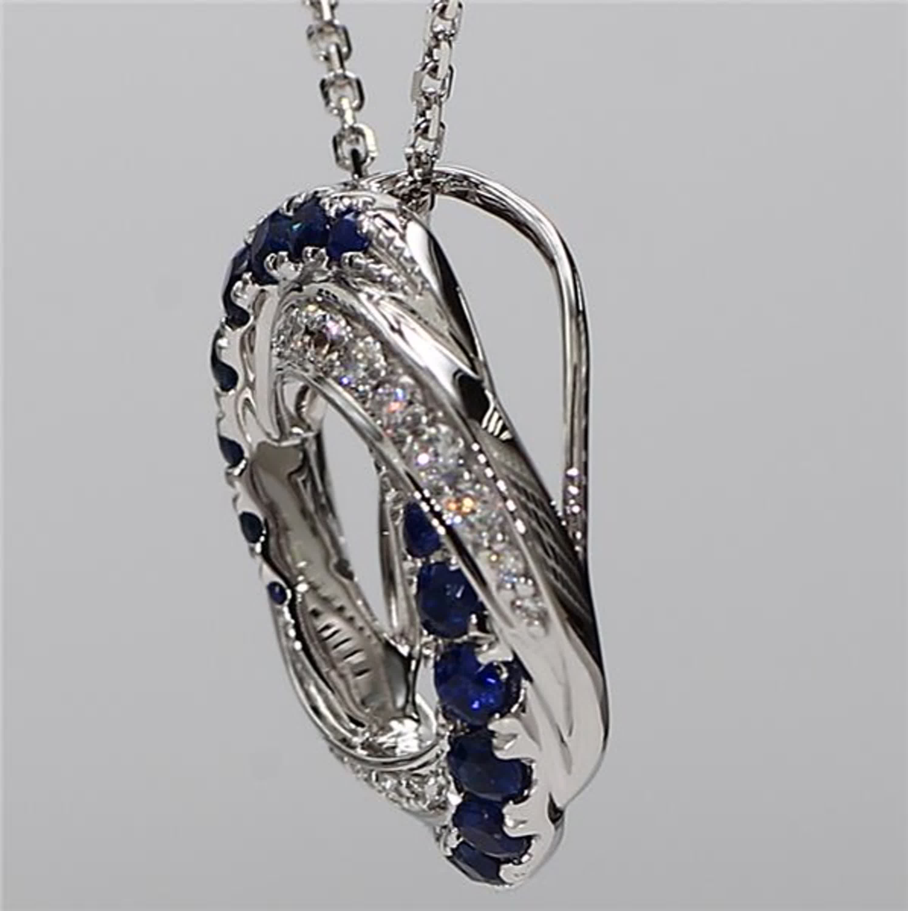 Natural Blue Round Sapphire and White Diamond .78 Carat TW White Gold Pendant