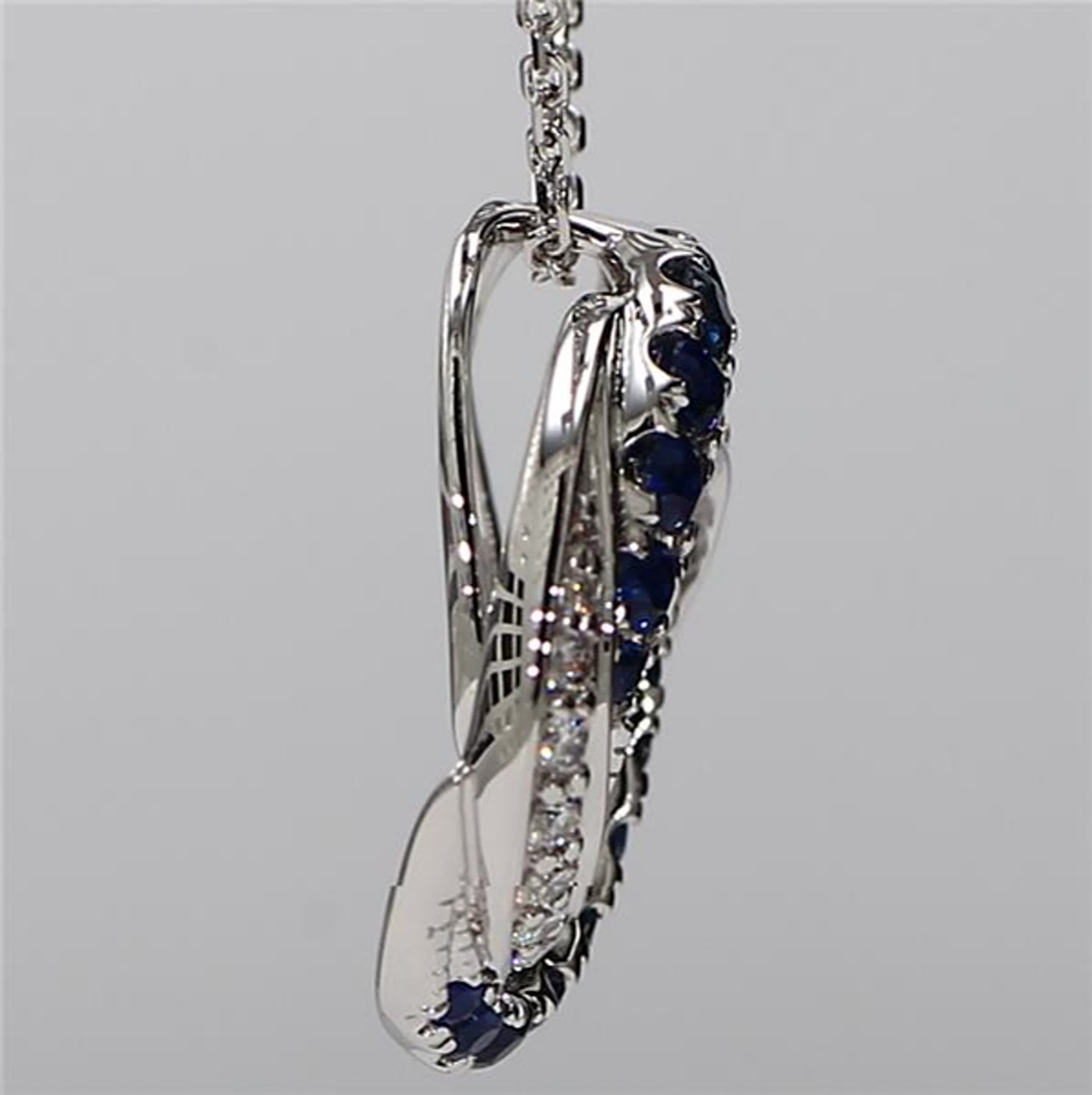 Natural Blue Round Sapphire and White Diamond .78 Carat TW White Gold Pendant