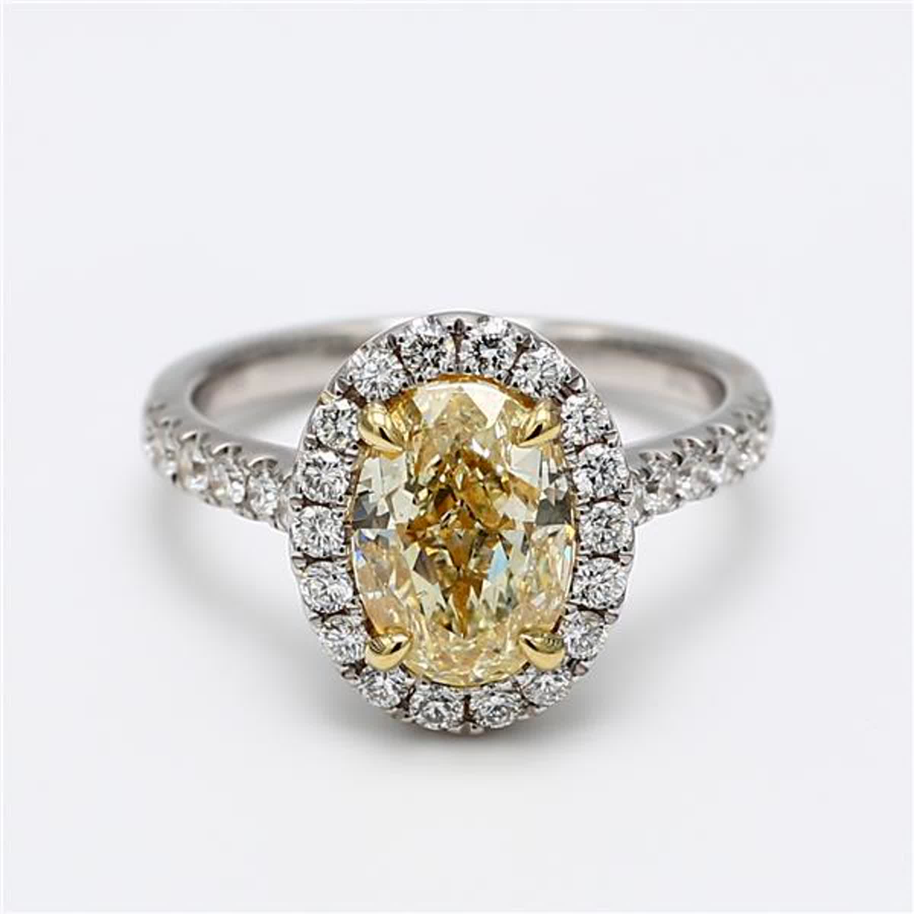 GIA Certified Natural Yellow Oval and White Diamond 3.11 Carat TW Platinum Ring