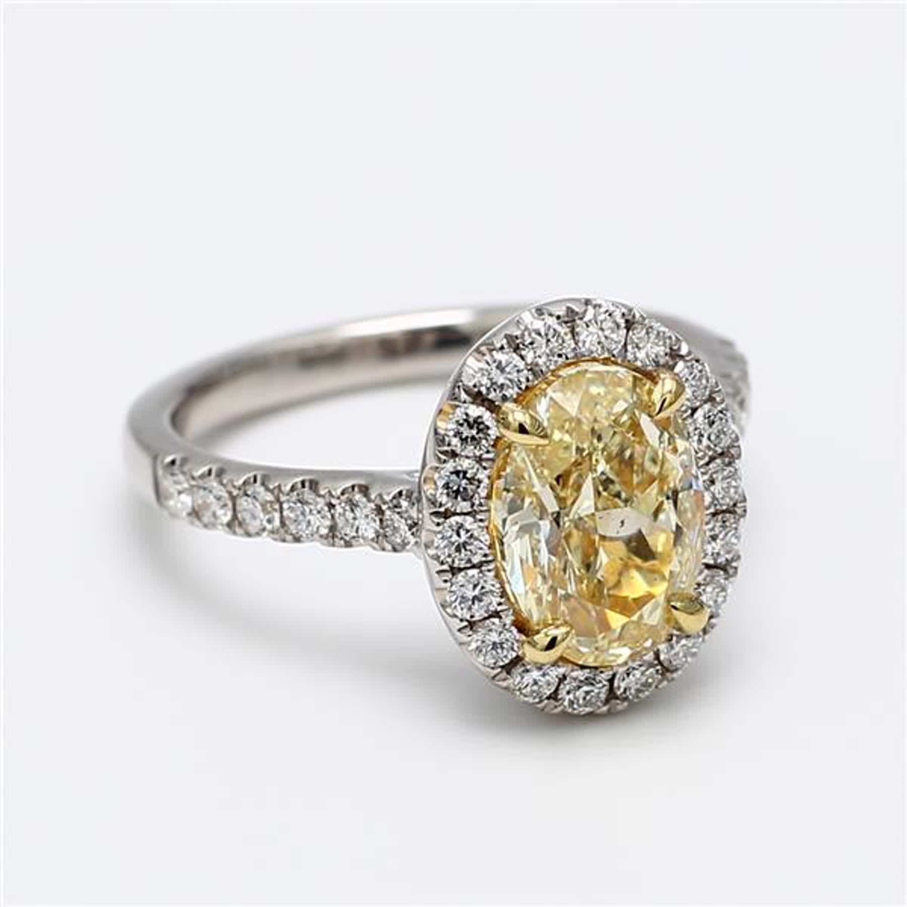 GIA Certified Natural Yellow Oval and White Diamond 3.11 Carat TW Platinum Ring
