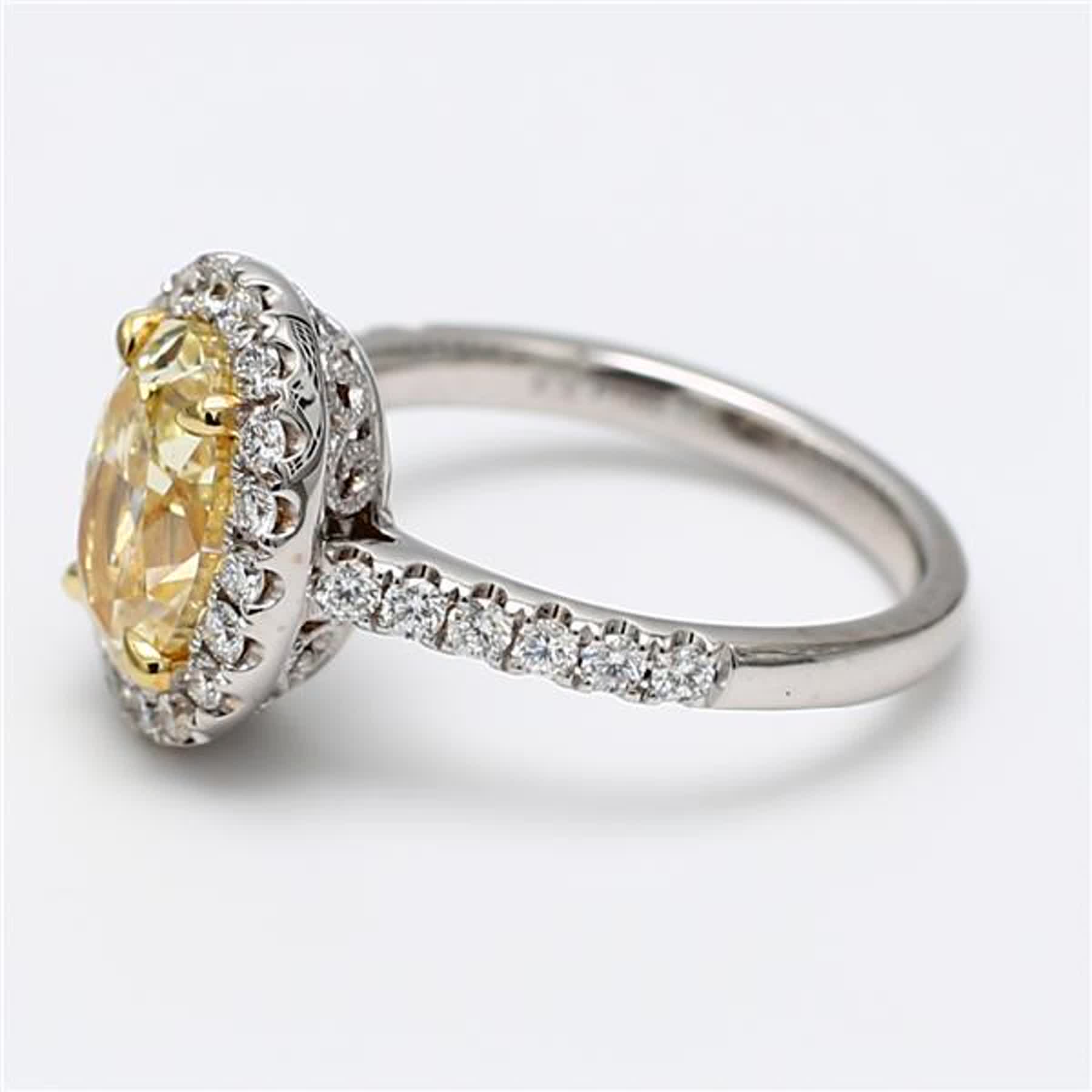 GIA Certified Natural Yellow Oval and White Diamond 3.11 Carat TW Platinum Ring