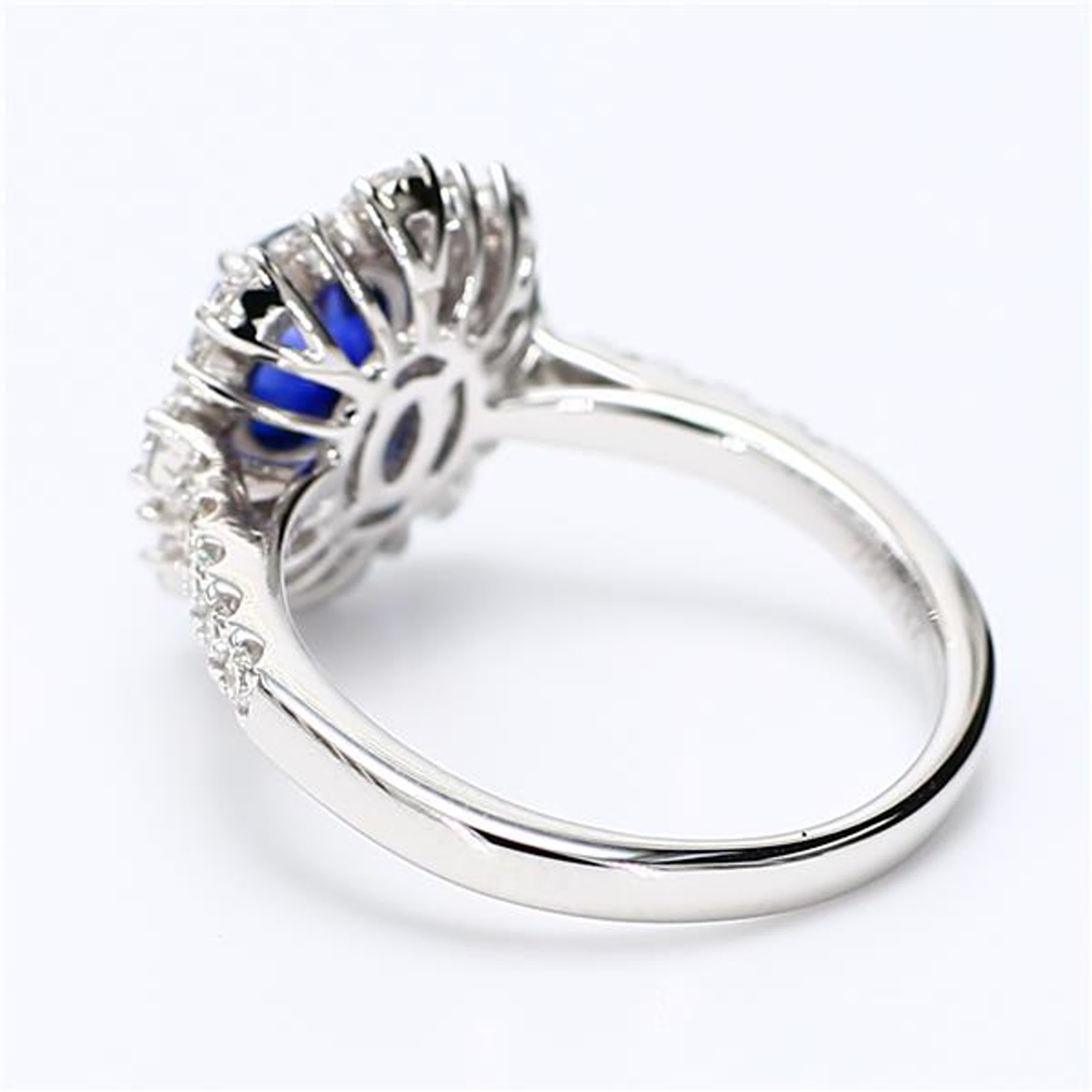 Natural Blue Oval Sapphire and White Diamond 2.11 Carat TW White Gold Ring