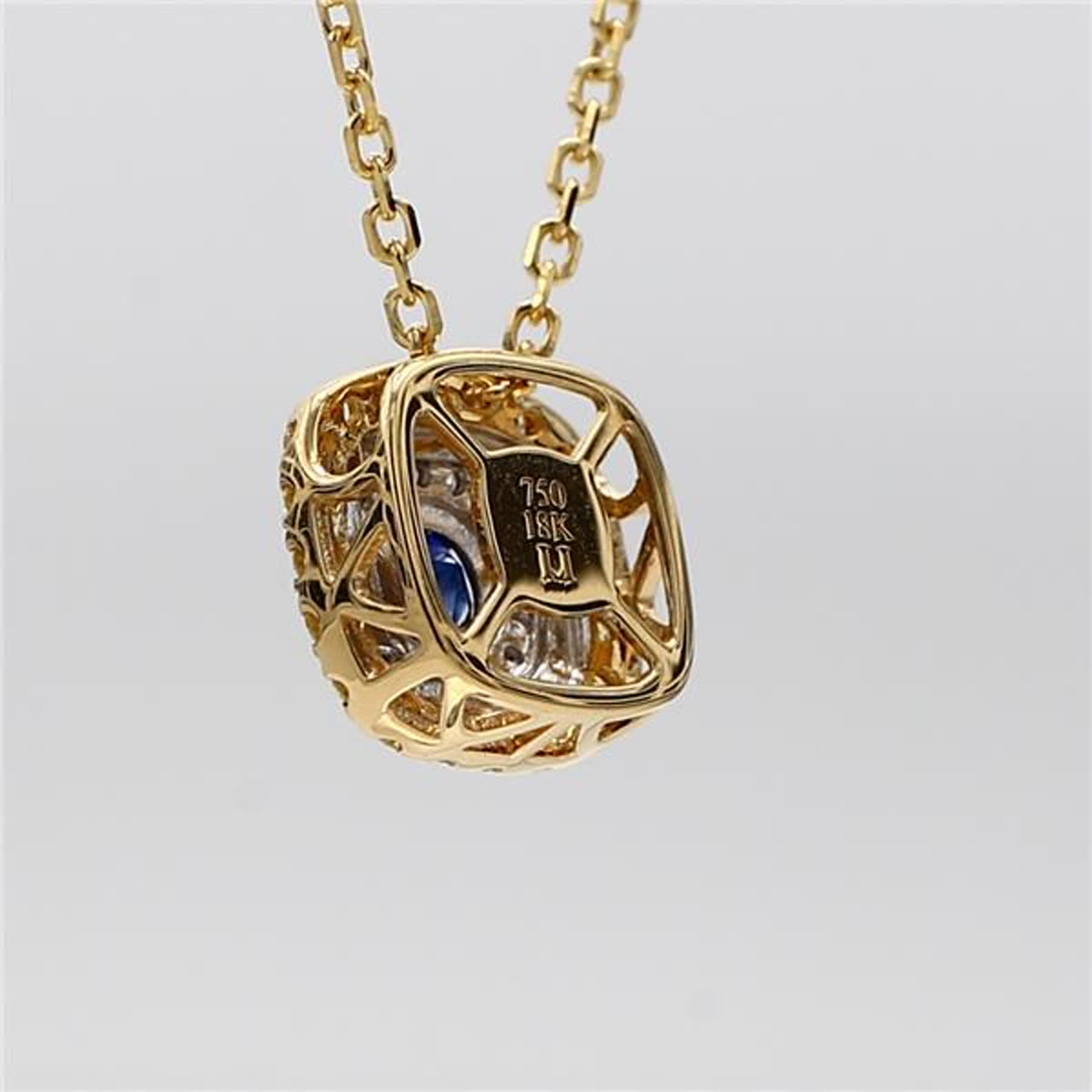 Natural Blue Round Sapphire and Diamond .61 Carat TW Gold Drop Pendant
