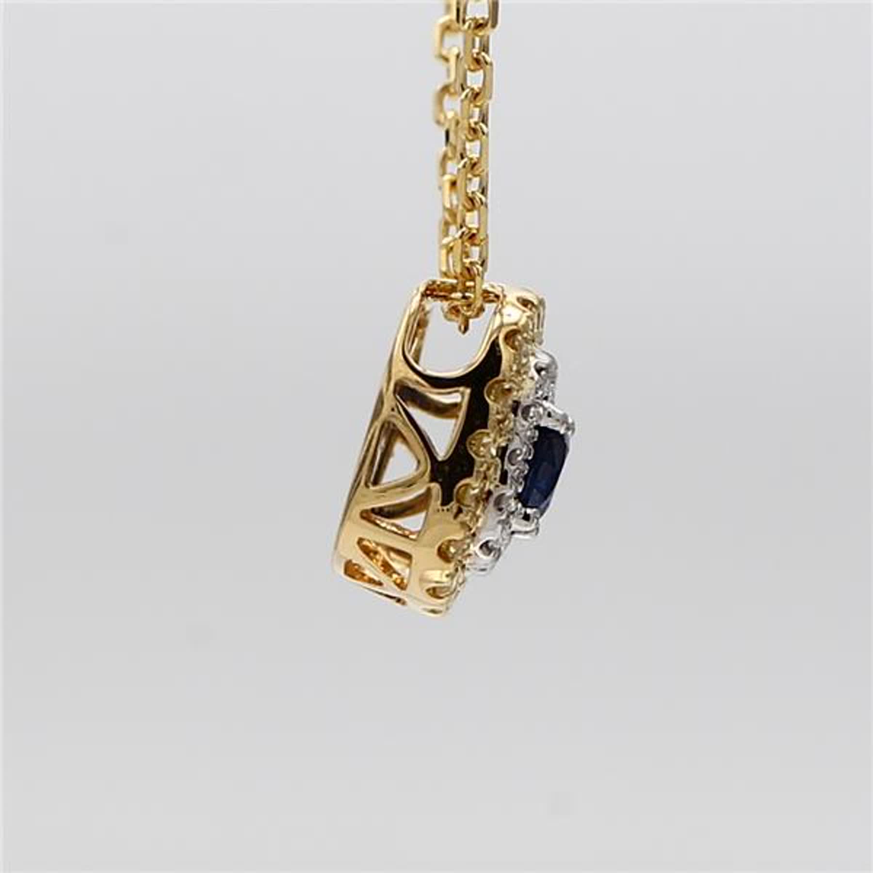 Natural Blue Round Sapphire and Diamond .61 Carat TW Gold Drop Pendant