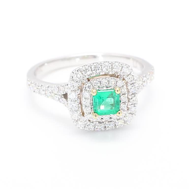 Natural Emerald Cut Emerald and White Diamond .74 Carat TW Gold Cocktail Ring