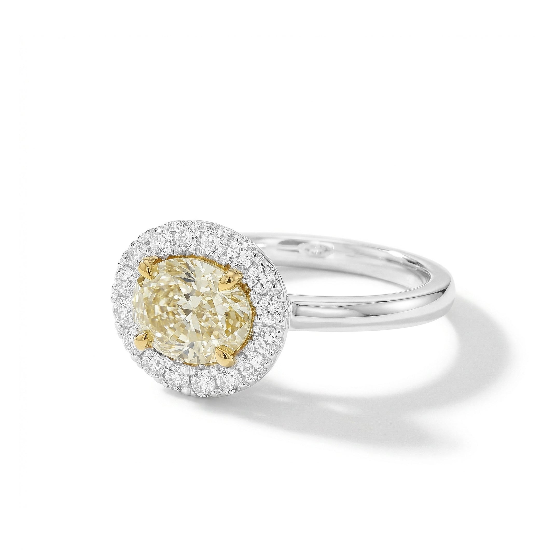 Natural Yellow Oval Diamond East/West Halo Ring | GIA Certified
