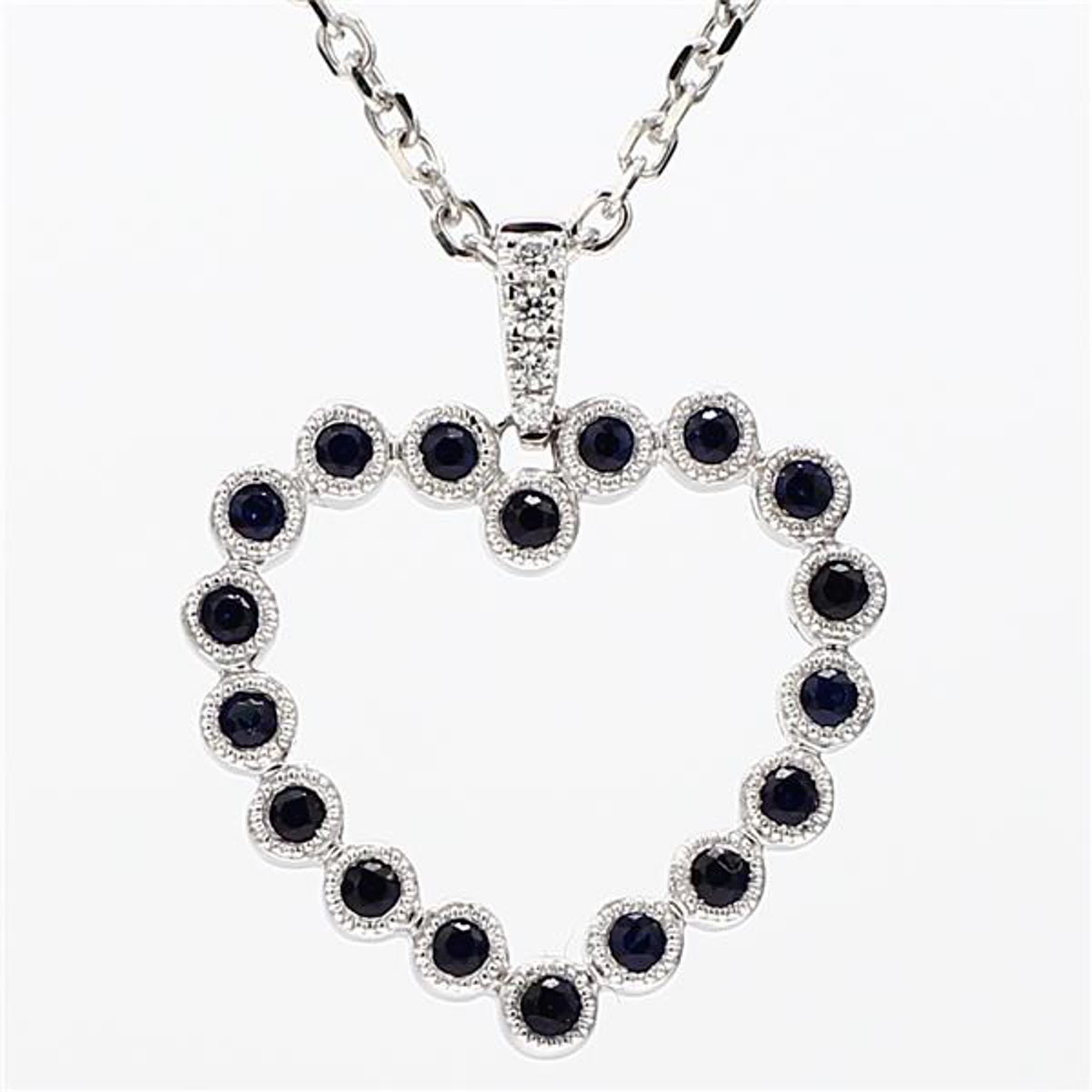 Natural Blue Round Sapphire and White Diamond .37 Carat TW White Gold Pendant