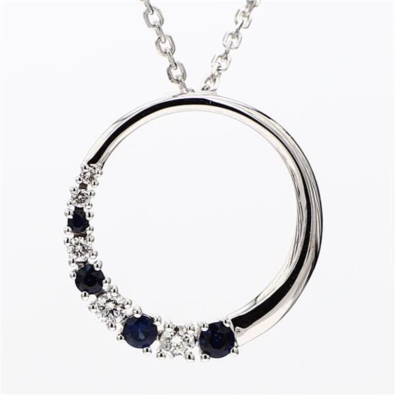 Natural Blue Round Sapphire and White Diamond .38 Carat TW White Gold Pendant