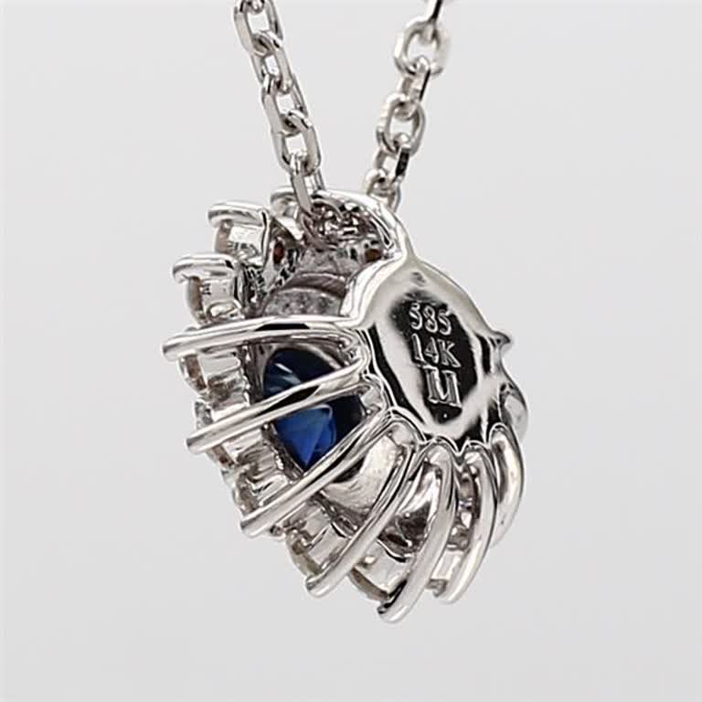 Natural Blue Round Sapphire and White Diamond ,72 Carat TW White Gold Pendant