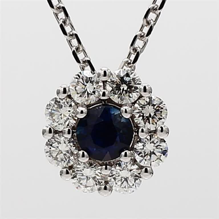 Natural Blue Round Sapphire and White Diamond .88 Carat TW White Gold Pendant