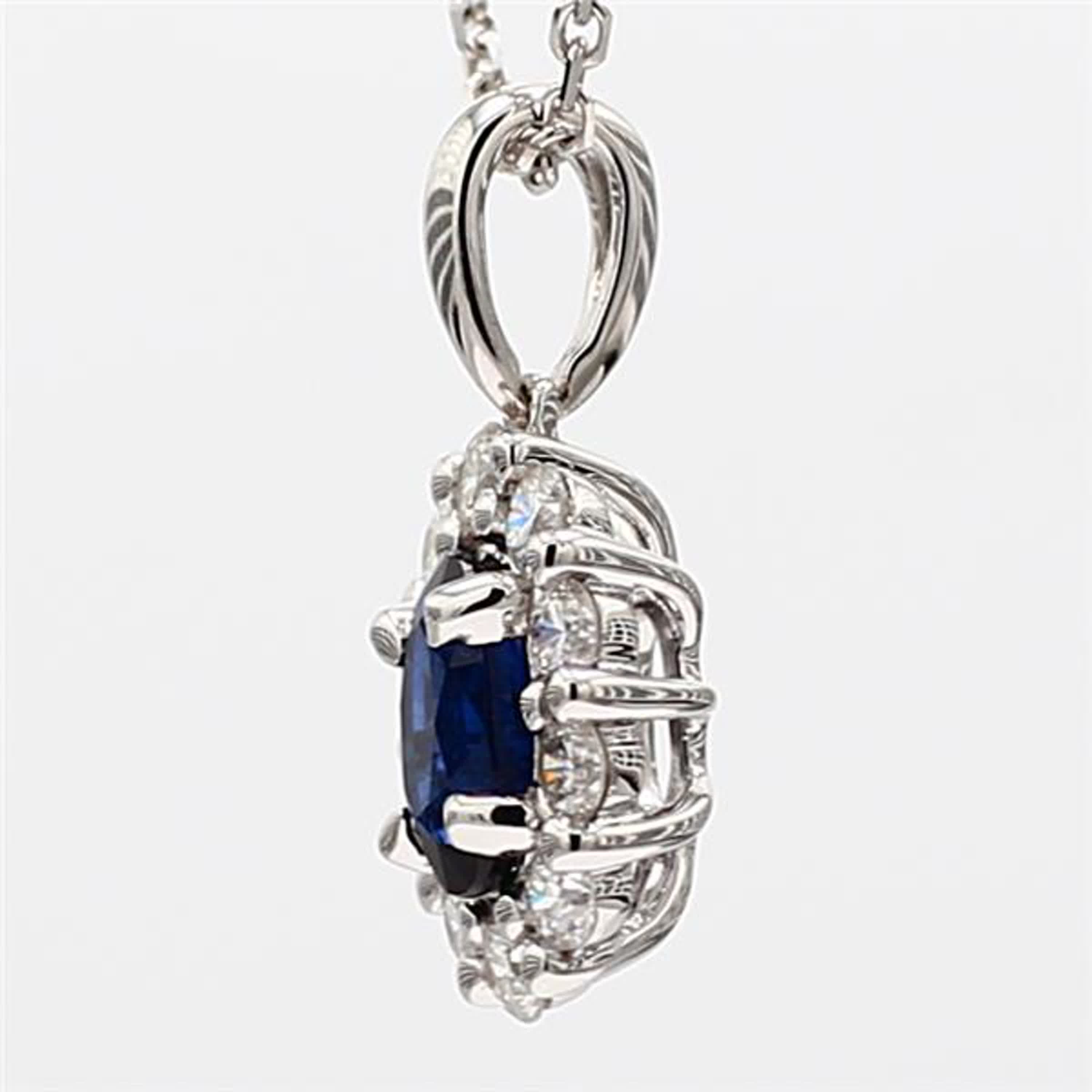 Natural Blue Oval Sapphire and White Diamond .99 Carat TW White Gold Pendant