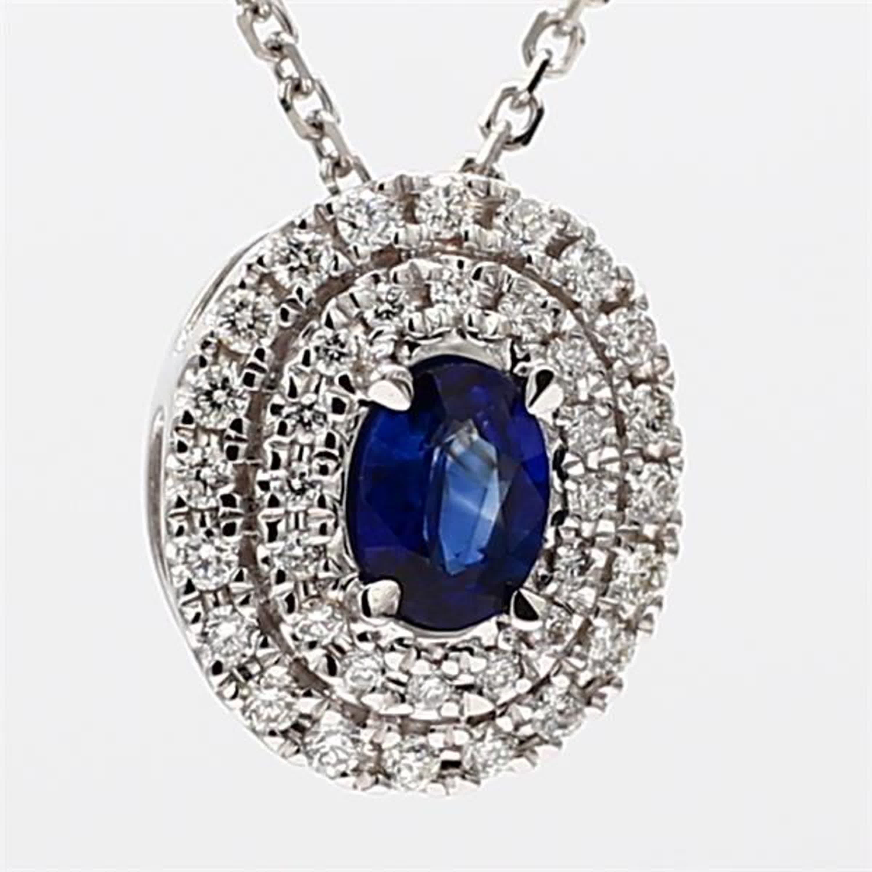 Natural Blue Oval Sapphire and White Diamond .67 Carat TW White Gold Pendant