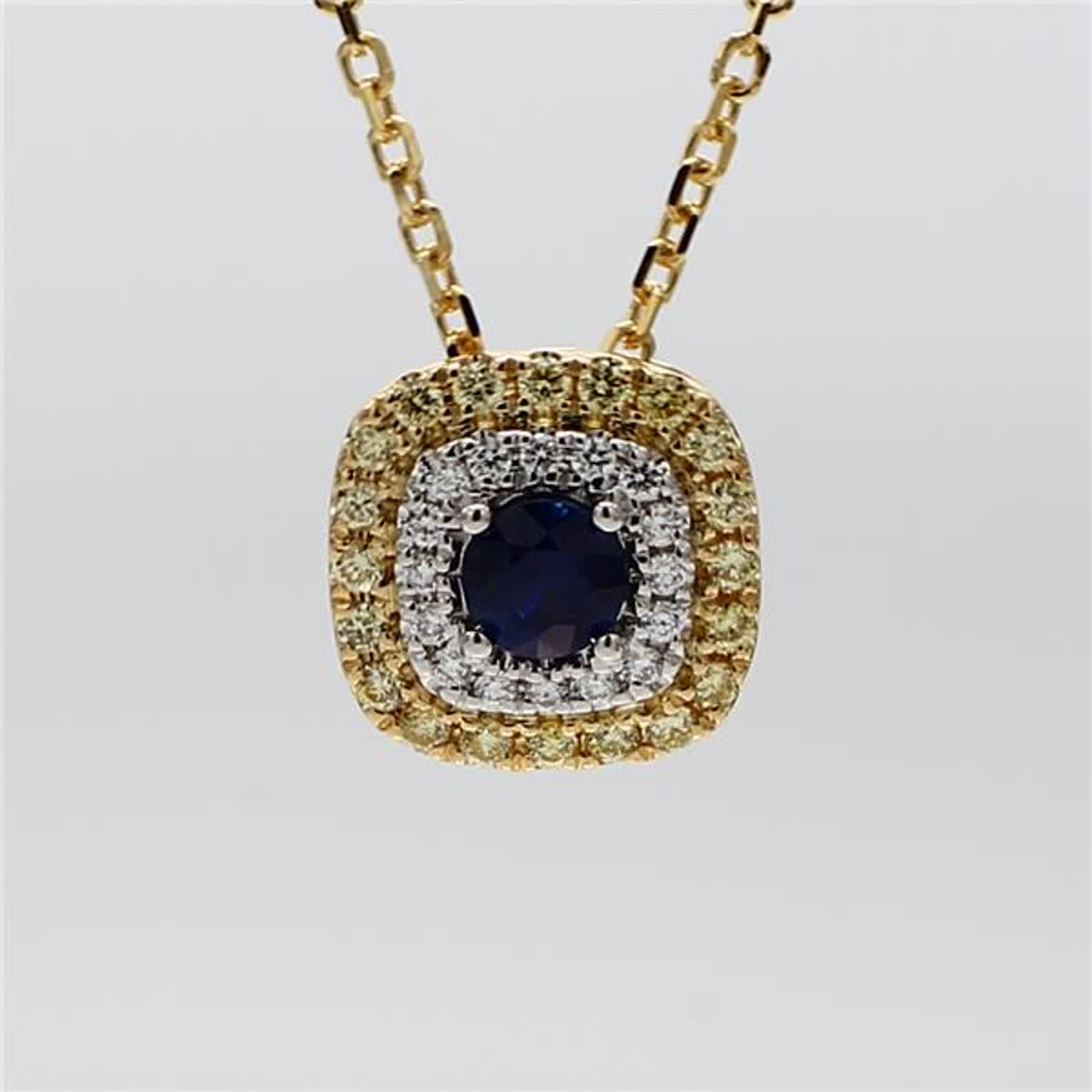 Natural Blue Round Sapphire and Diamond .61 Carat TW Gold Drop Pendant