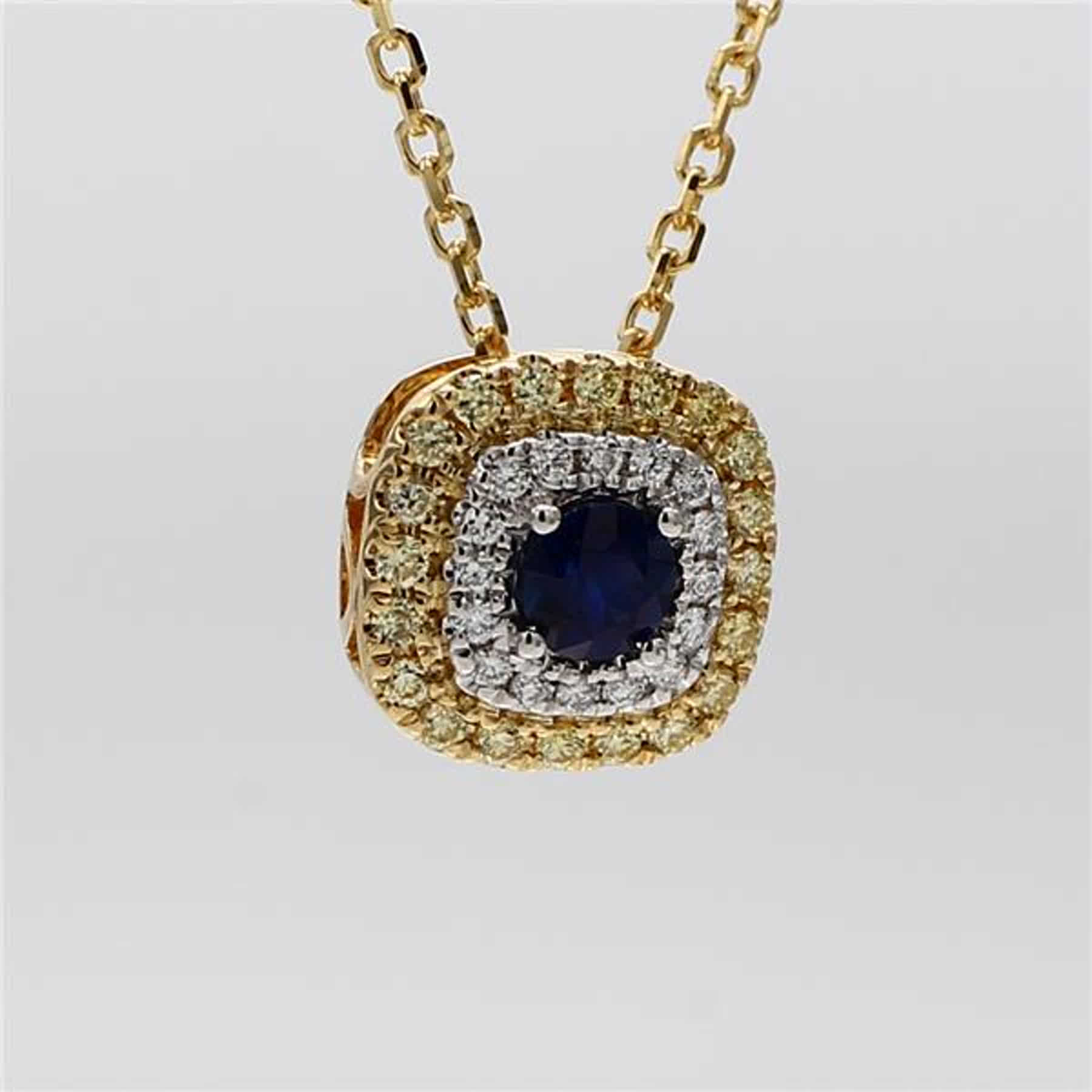 Natural Blue Round Sapphire and Diamond .61 Carat TW Gold Drop Pendant